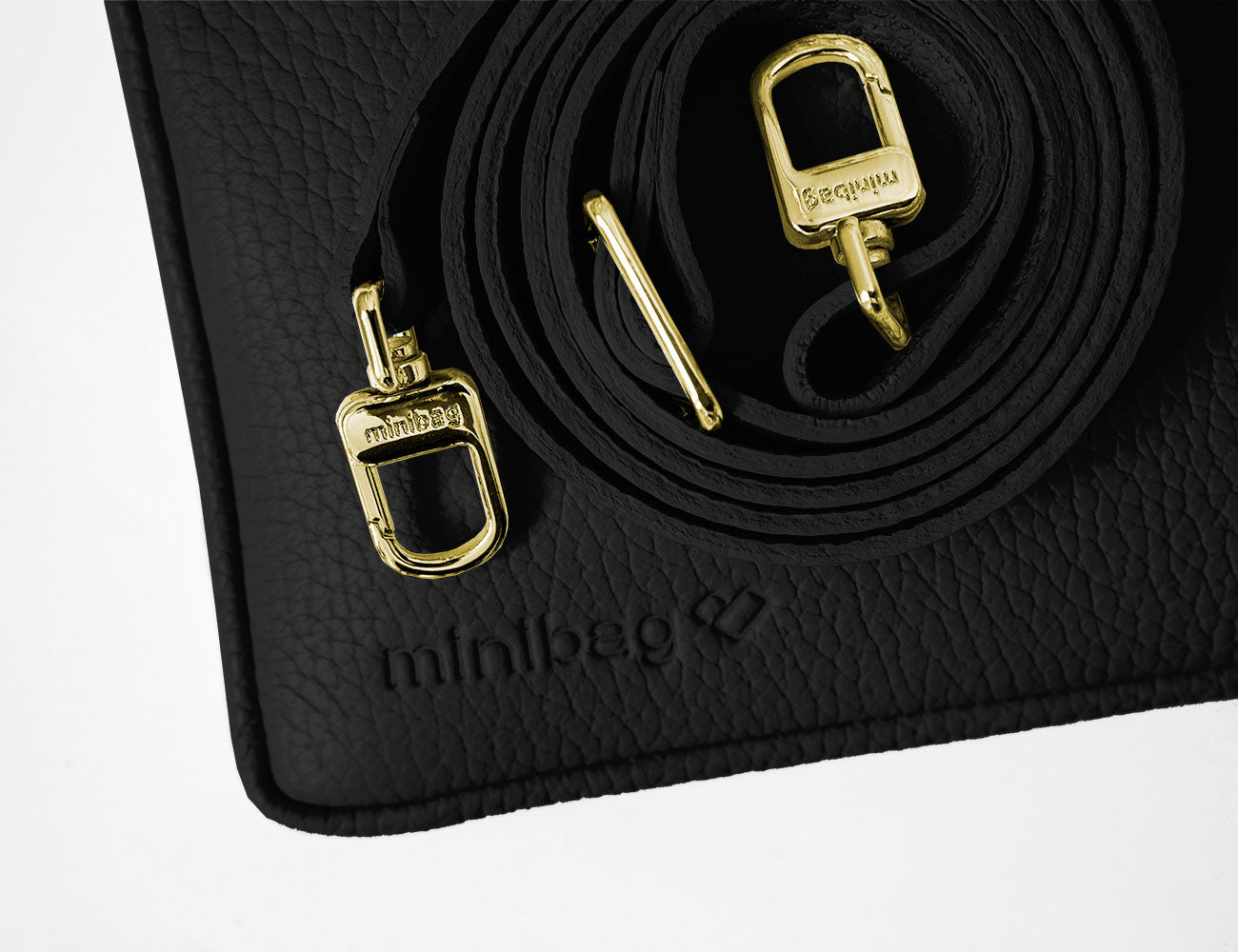 minibag black Edition GOLD, schwarze Ledertasche, goldene Riemen, Prägung minibag Logo, minibag,  kleine schwarze Tasche zum Umhängen, Handytasche zum Umhängen, Handytasche mit Geldbörse